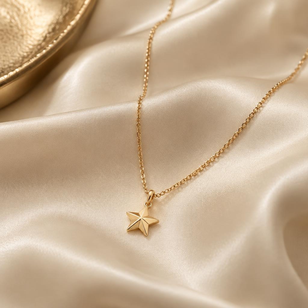 L'ÉRA gold jewelry on ivory silk